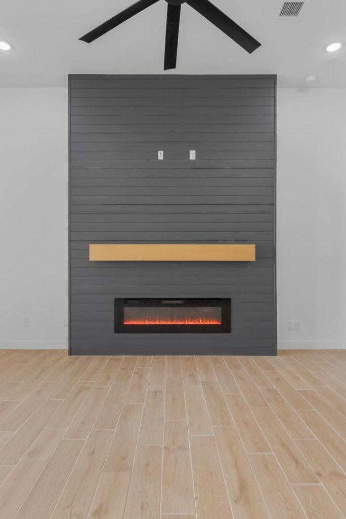 Fireplace feature wall in an Artemis F floorplan home by Nueva Luna Builders in El Paso, Texas