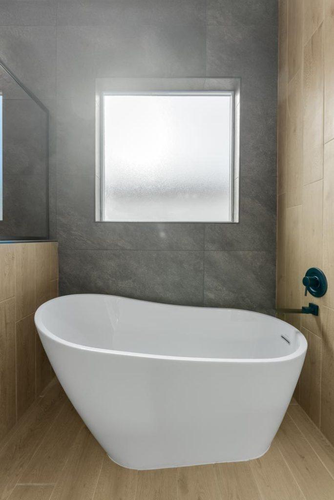 Primary bath with freestanding soaking tub in an Artemis F floorplan home by Nueva Luna Builders in El Paso, Texas