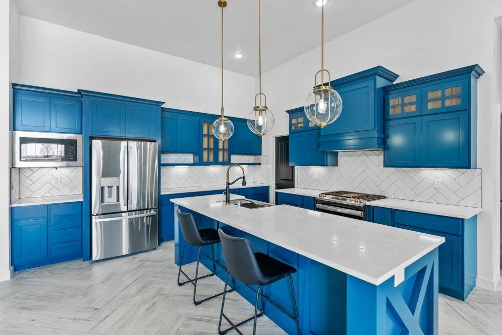Kitchen & Island in an Artemis floorplan home by Nueva Luna Builders in El Paso, Texas