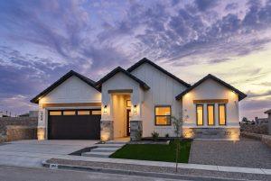 Twilight exterior in the Io F floorplan — Nueva Luna Builders, El Paso, Texas