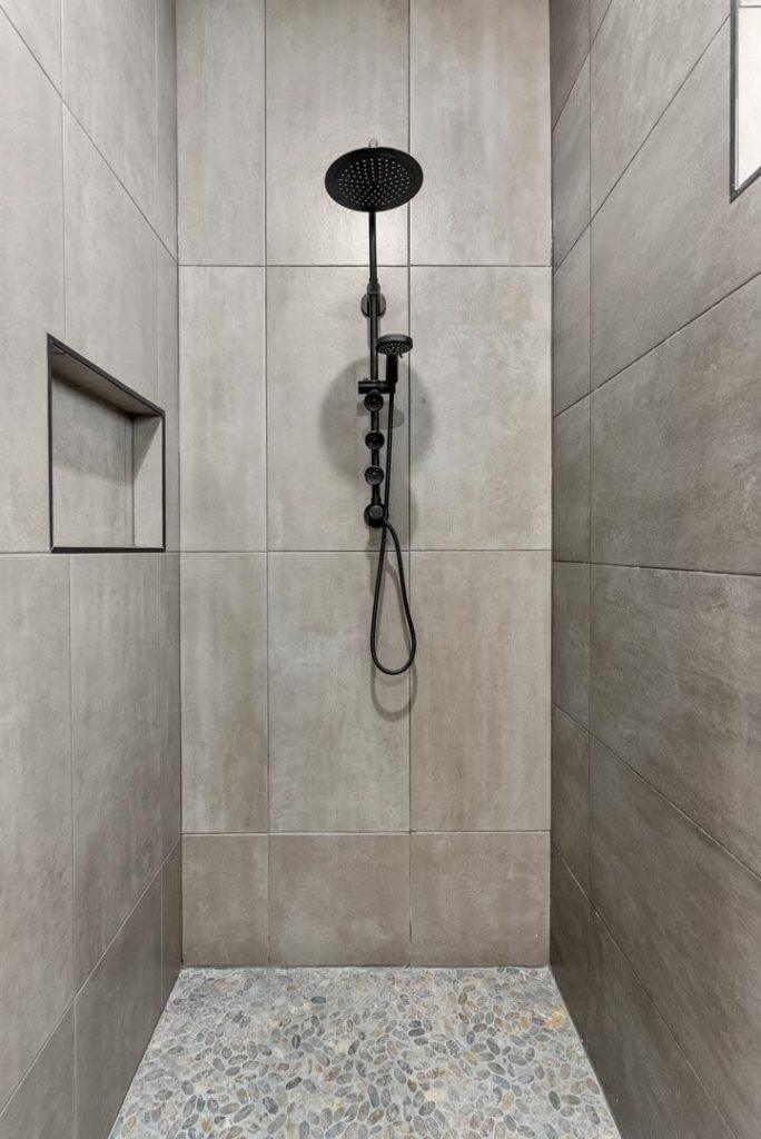 Tile Shower in an Io M SE floorplan home by Nueva Luna Builders in El Paso, Texas